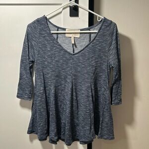Puella V-neck shirt. 3/4 length sleeve. Size Small